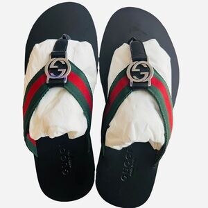 Gucci Black Rubber Slides with Embossed Logo